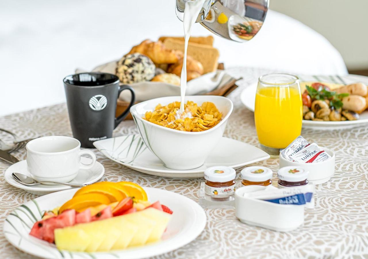 多哈罗塔纳城市中心酒店 外观 照片 A continental breakfast